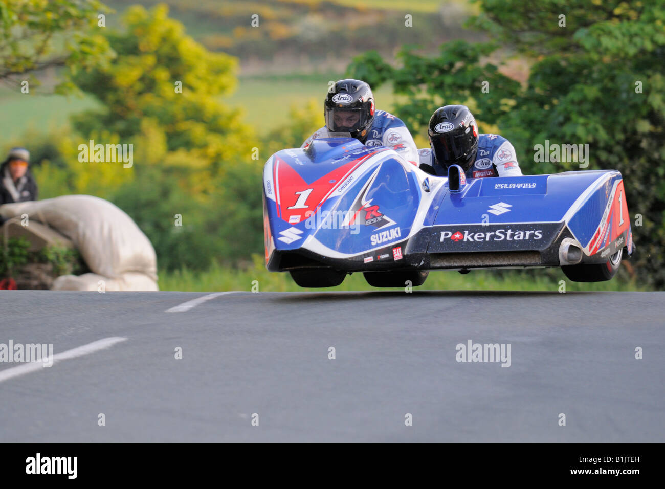 Dave Molyneux and Dan Sayle leap Ballaugh bridge in their sidecar TT08. Stock Photo