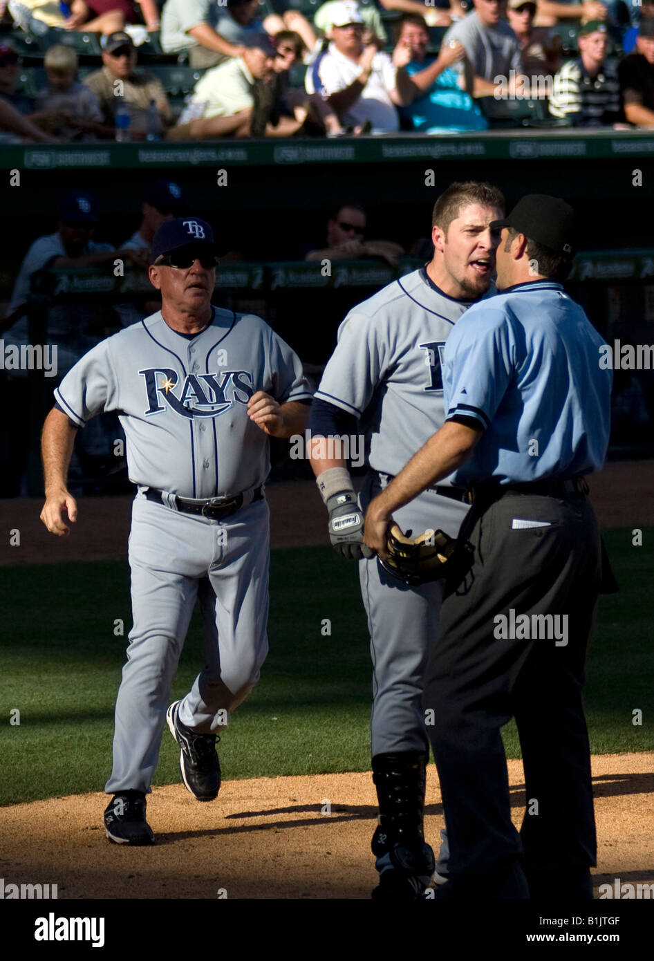 Tampa Bay Devil Rays player Erik Henske yells at the umpire after being called out at the plate. Stock Photo