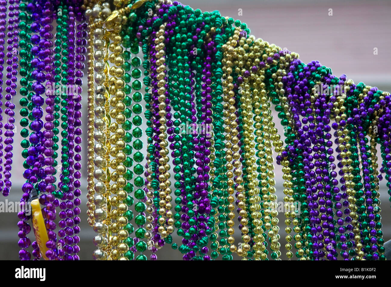 Mardi Gras beads gathered together on the streets of New Orleans Stock