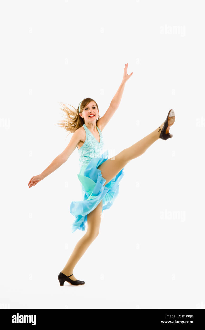 Teenage Girl Dancer Doing a High Kick Stock Photo