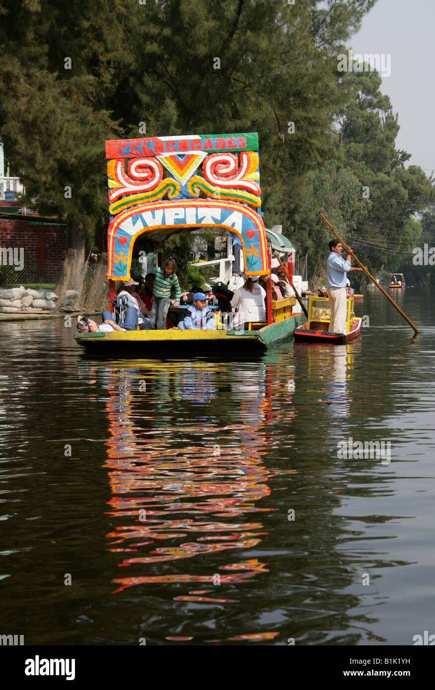 Trajinera Boat on the Canals of the Floating Gardens of Xochimilco Mexico City Stock Photo
