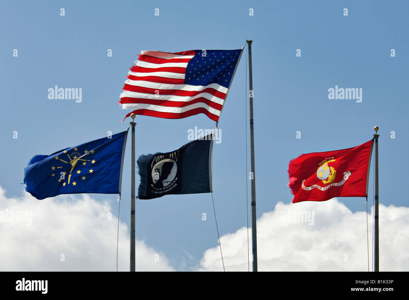 Tattered Flags Waving in a Breeze in Washington County Indiana Stock Photo