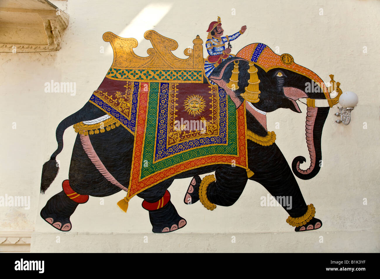 A painting of an ELEPHANT and RIDER of the wall of the CITY PALACE of