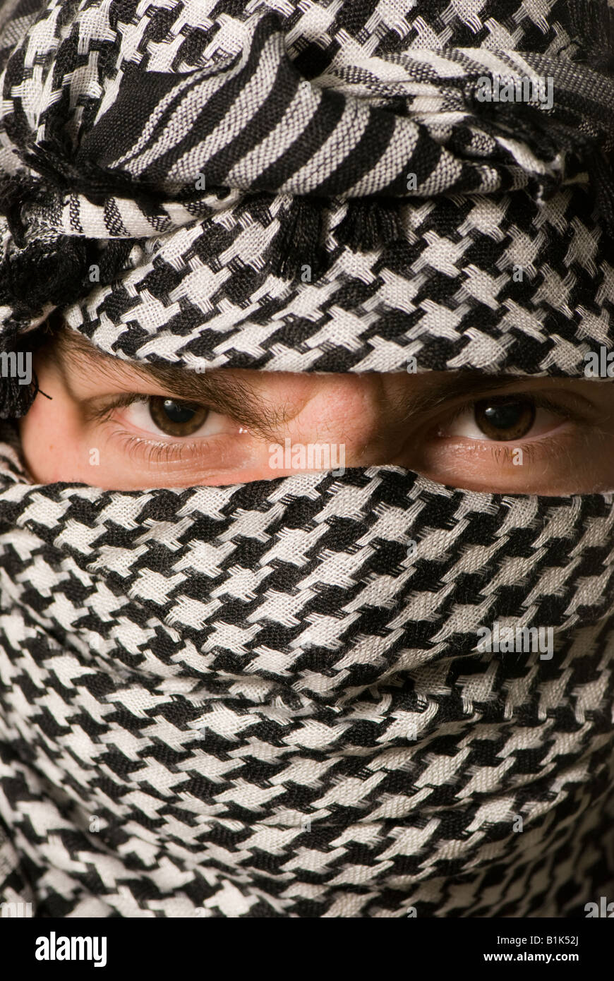 Close up of eyes in Arab shemagh headscarf Stock Photo