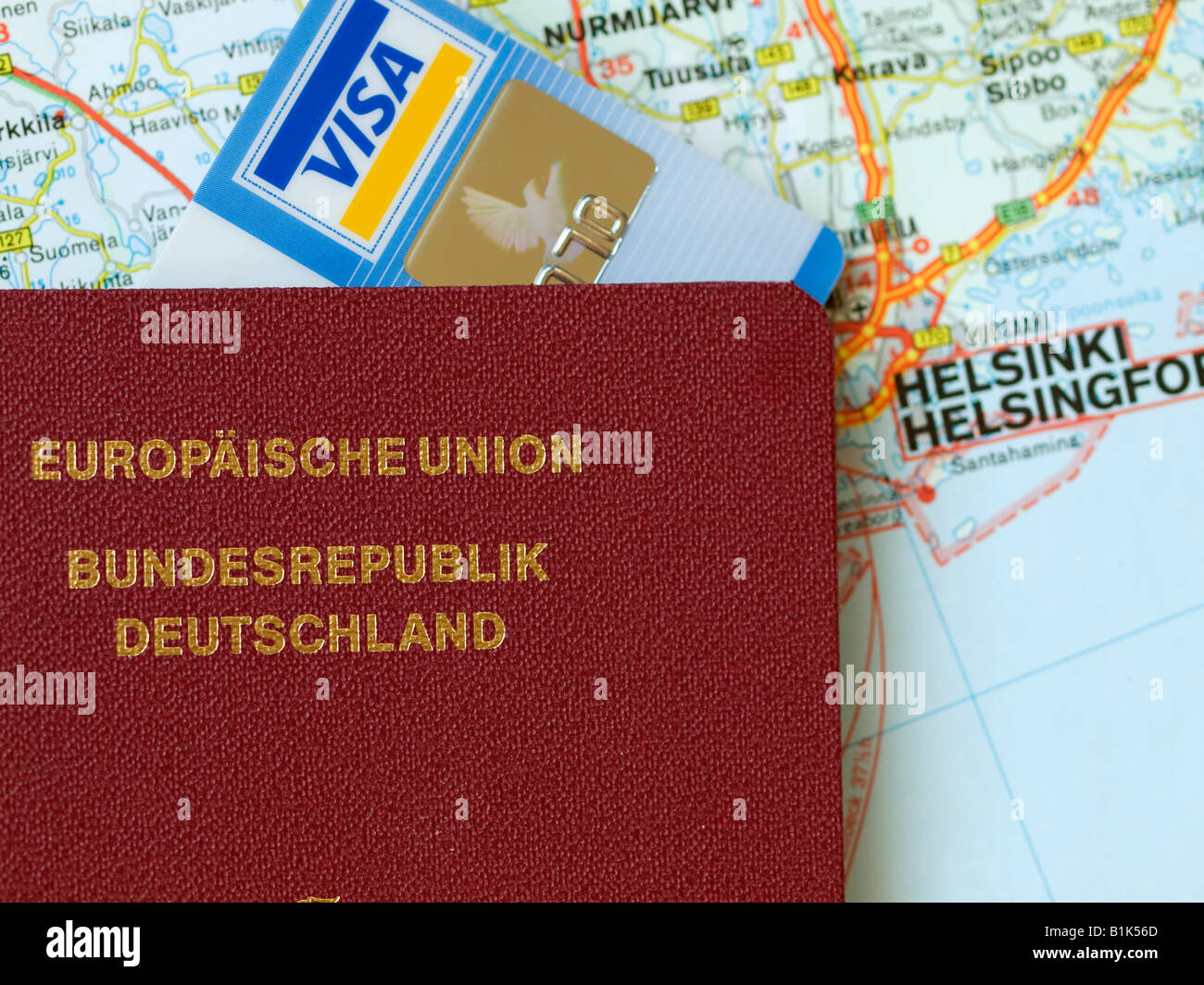 passport travel visa card credit card on a map of Helsinki Finland Stock Photo