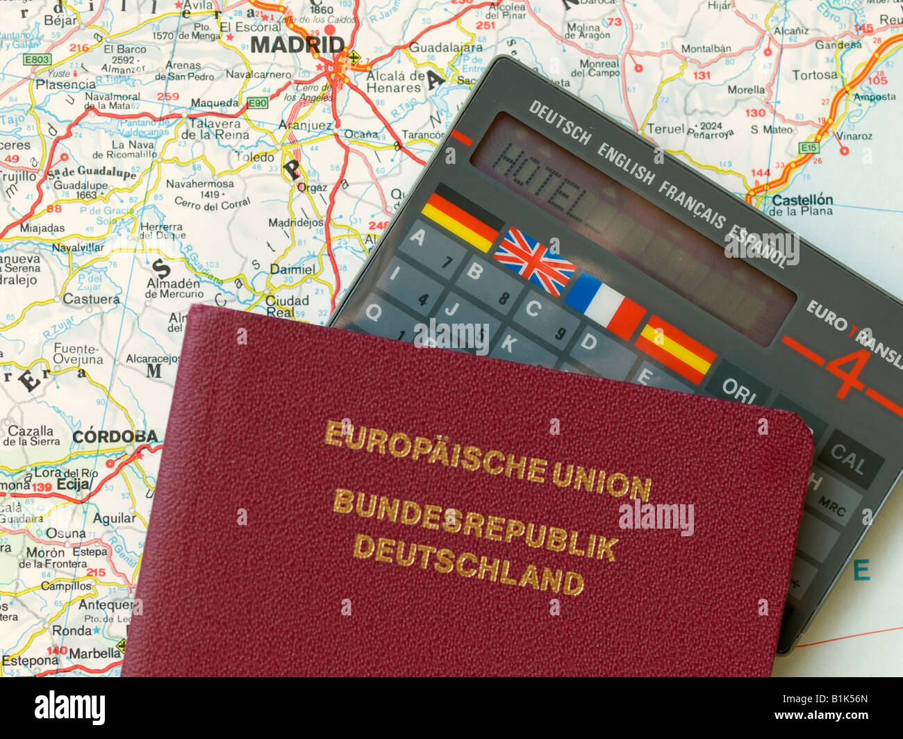 passport travel translation computer tool instrument on a map of Spain with Madrid Stock Photo