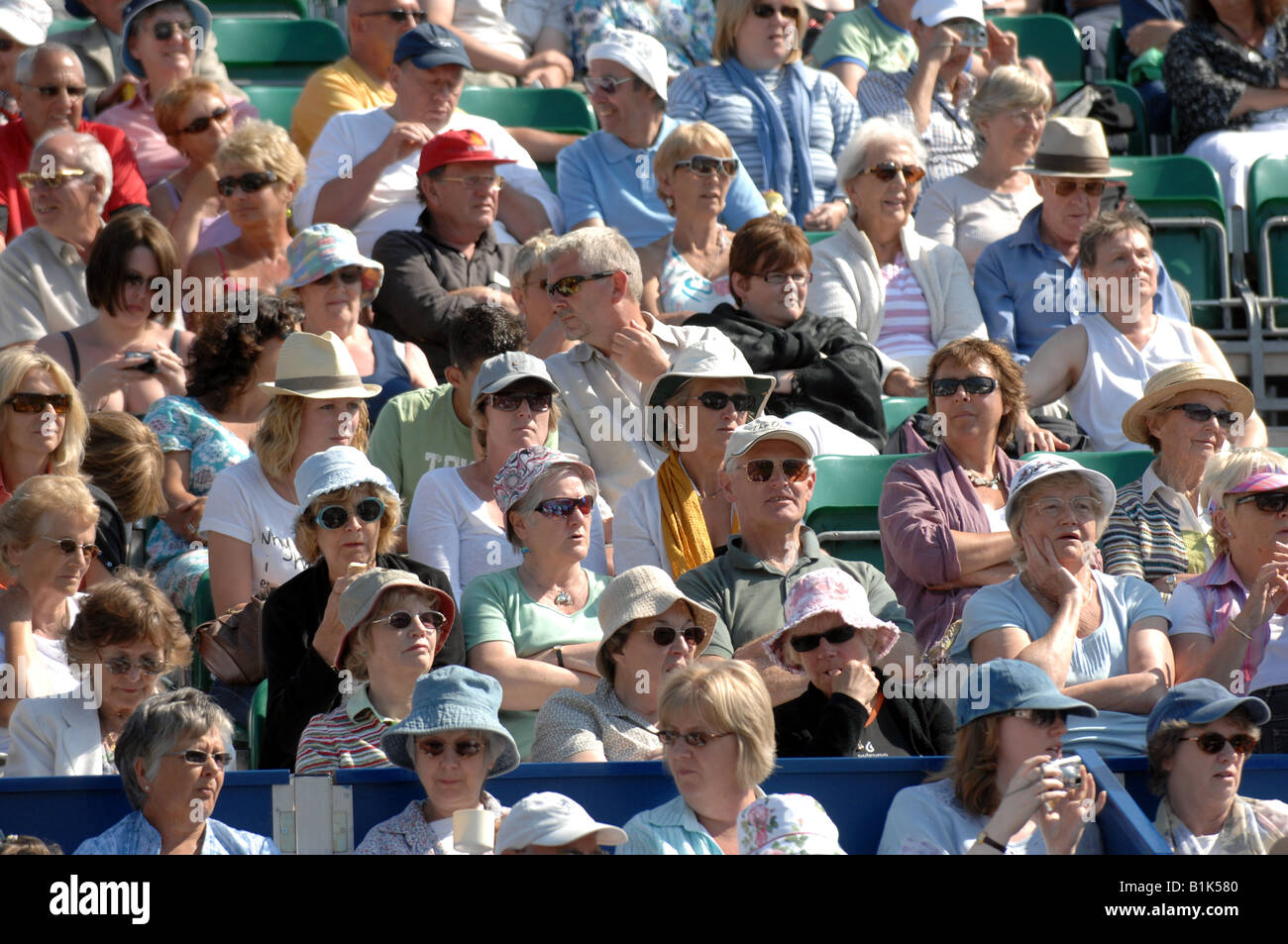 Crowd watching tennis at Devonshire Park Eastbourne UK Stock Photo