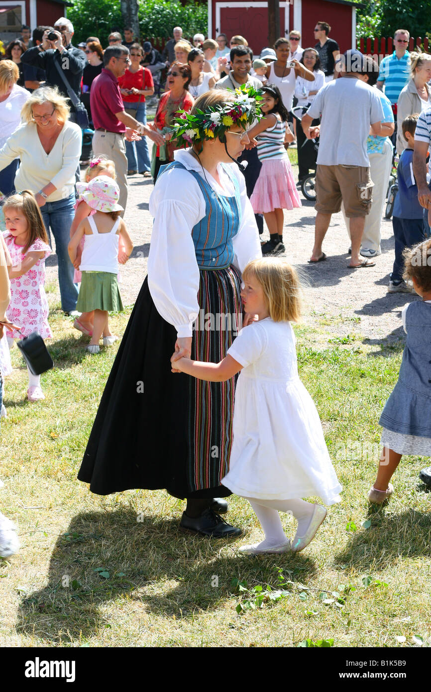 People dancing on midsummer eve Stock Photo - Alamy