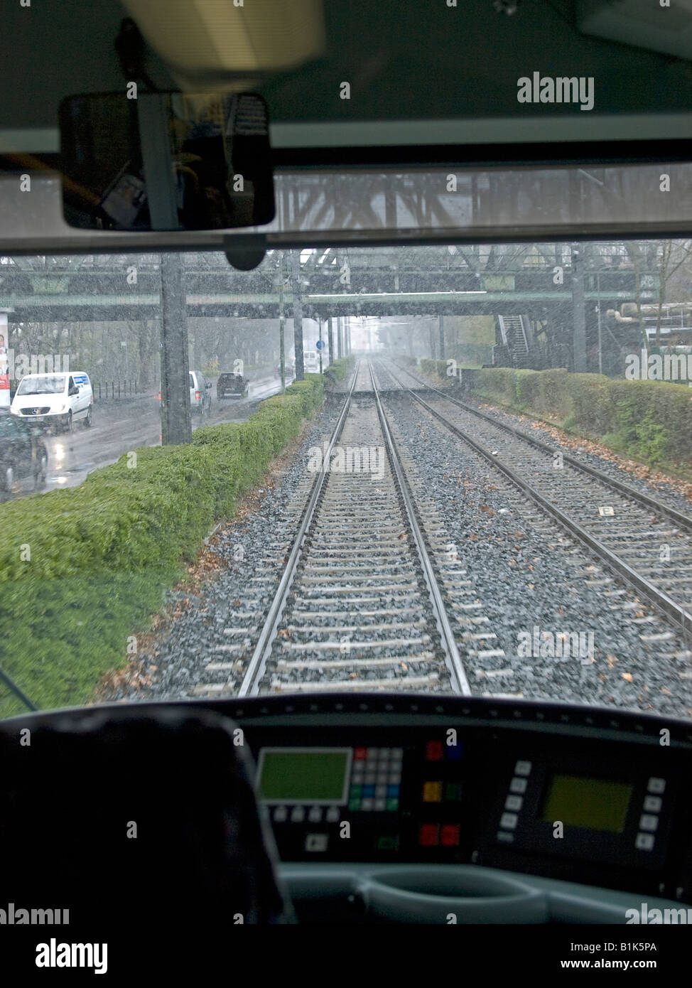 Empty Rails view from drivers cabin of a tram along empty rails on a rainy day tram ...