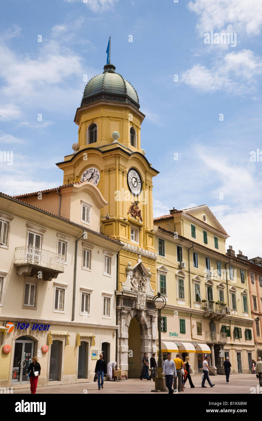 Baroque Civic Tower clock gateway in pedestrianised Korzo Street with people in city shopping centre. Rijeka Istria Croatia Europe Stock Photo