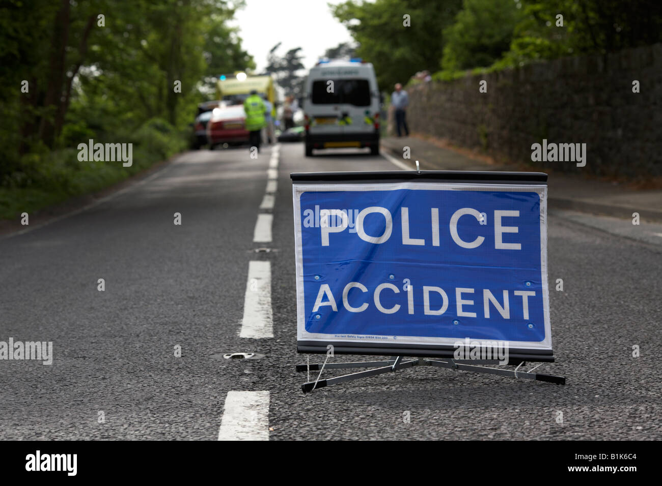 police accident temporary sign in the middle of the road at the scene of a road traffic accident county down northern ireland Stock Photo
