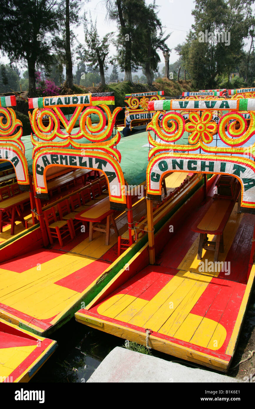 Colourful Trajinera Boats on the Canals of the Floating Gardens of Xochimilco, Mexico City Stock Photo
