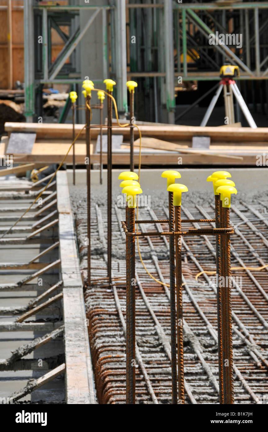 Construction site health and safety bright yellow caps fitted to