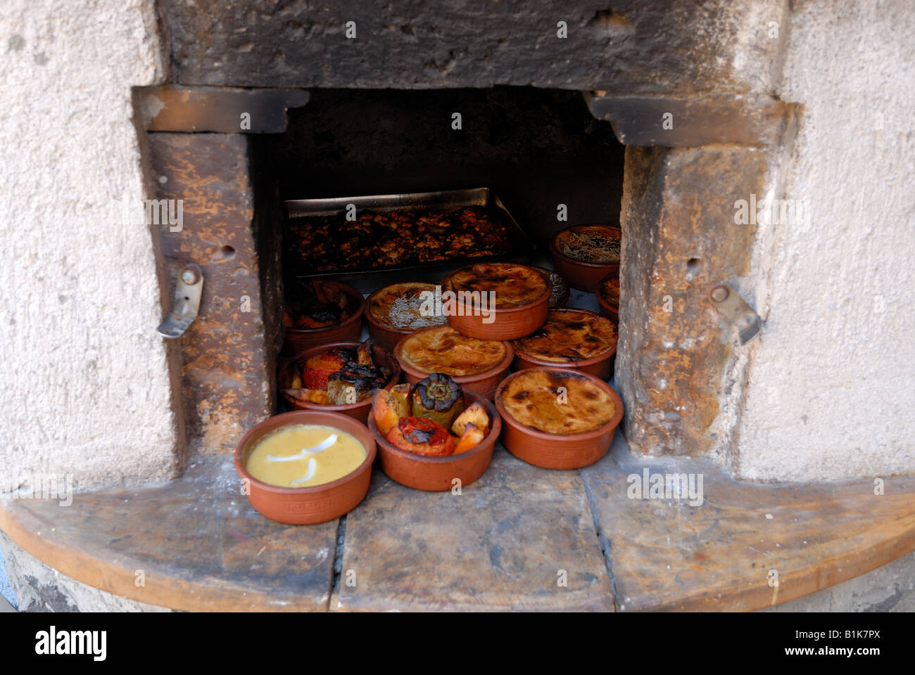 Fresh prepared Greek dishes in the oven Stock Photo