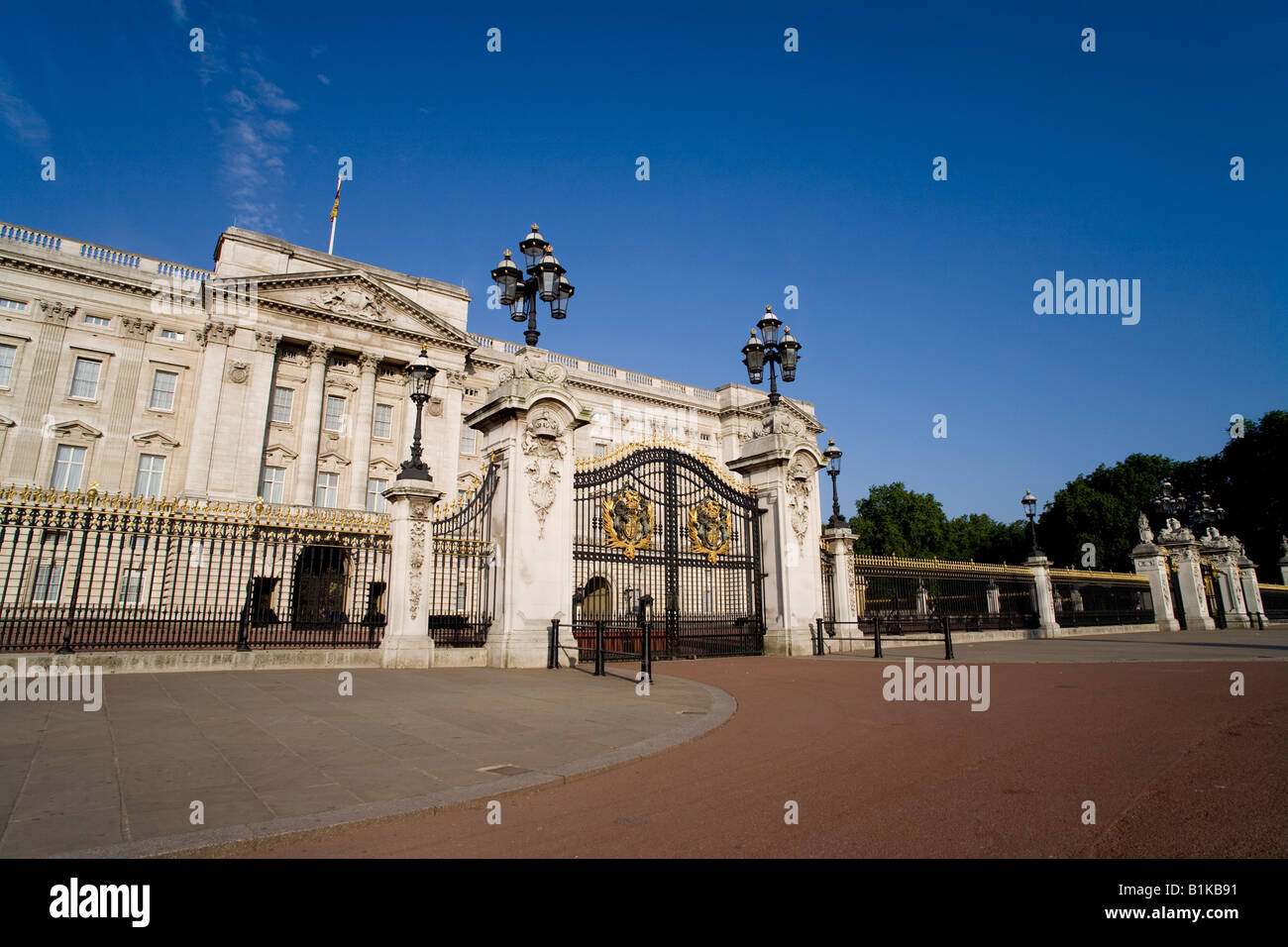 Gate and front of Buckingham Palace on a sunny summer's morning London England UK Royal Standard shows Queen in residence Stock Photo
