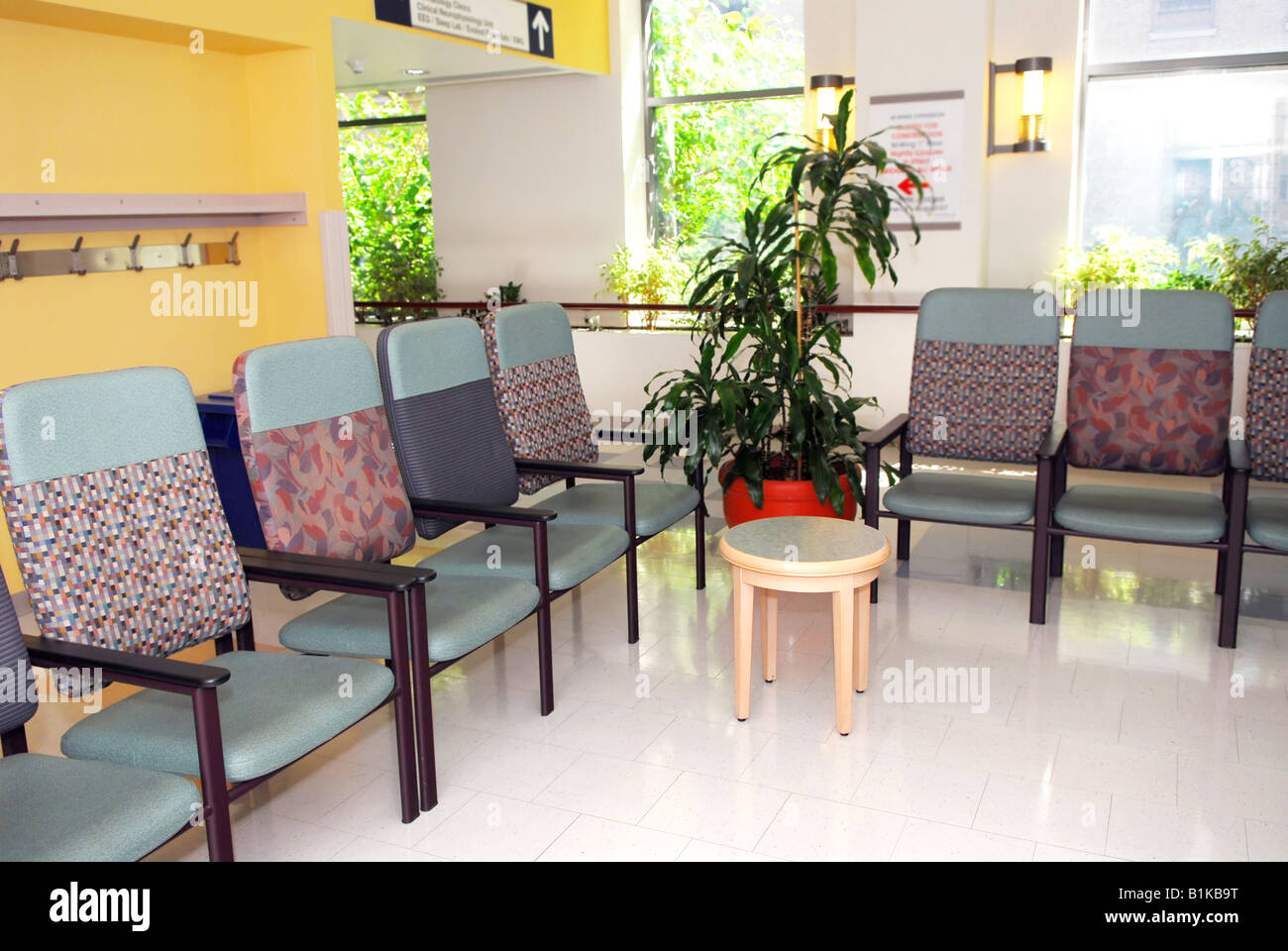 Hospital Or Clinic Waiting Room With Empty Chairs Stock Photo