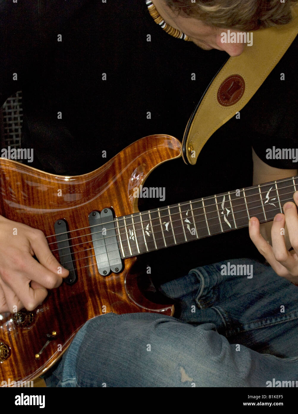 Teenager playing electric guitar Stock Photo Alamy