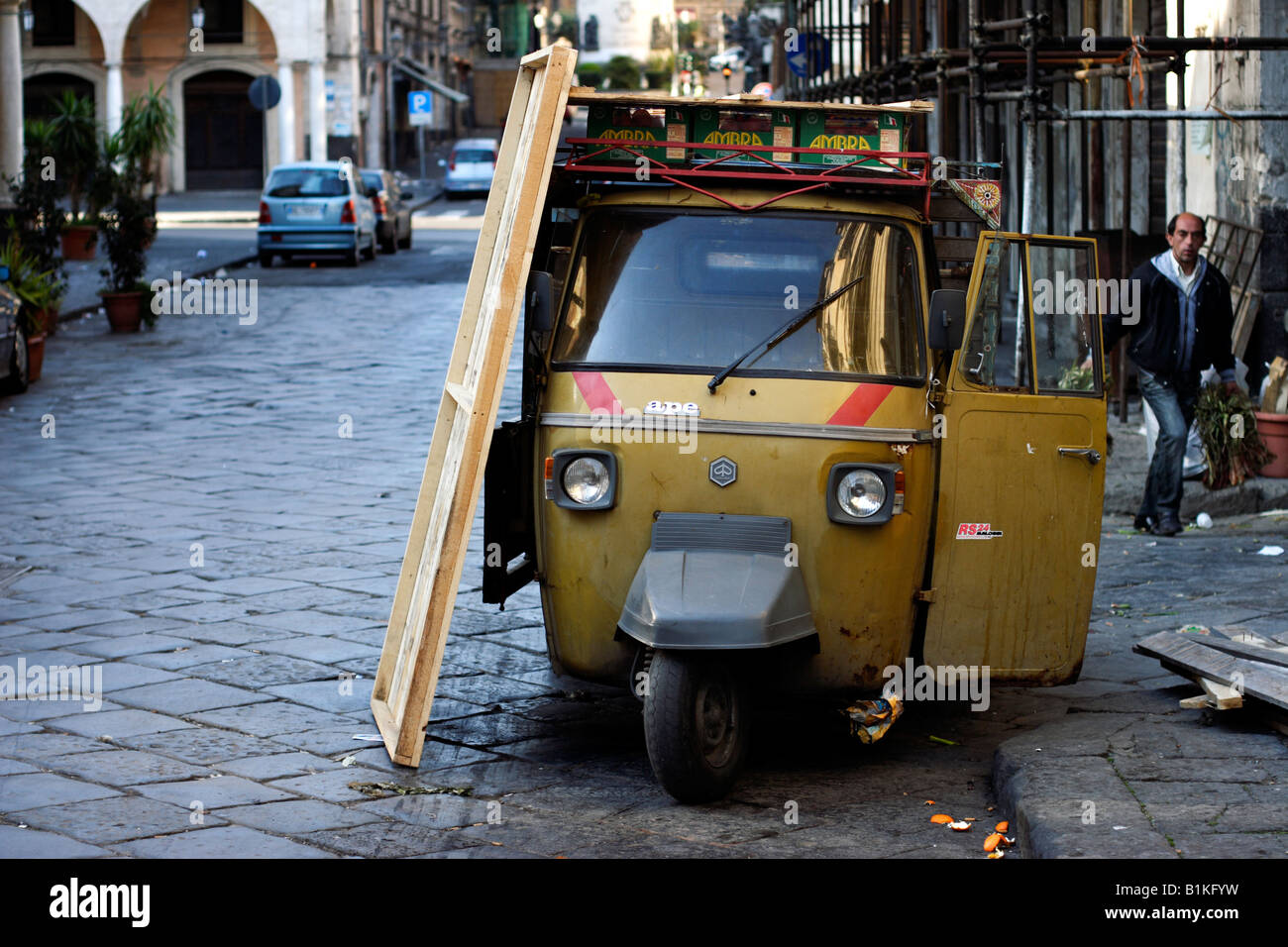 Piaggio ape parked on a street in Catania, Sicily, Italy Stock Photo