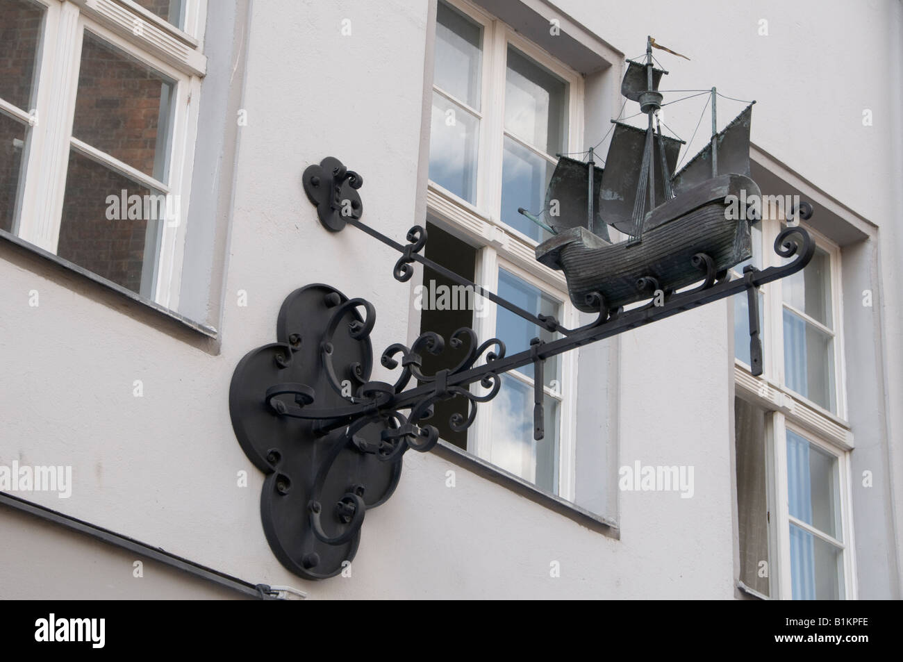 Medieval wrought iron shop sign depicting a caravel in Rathaus area Mitte Quarter Scheunenviertel Berlin Germany Stock Photo