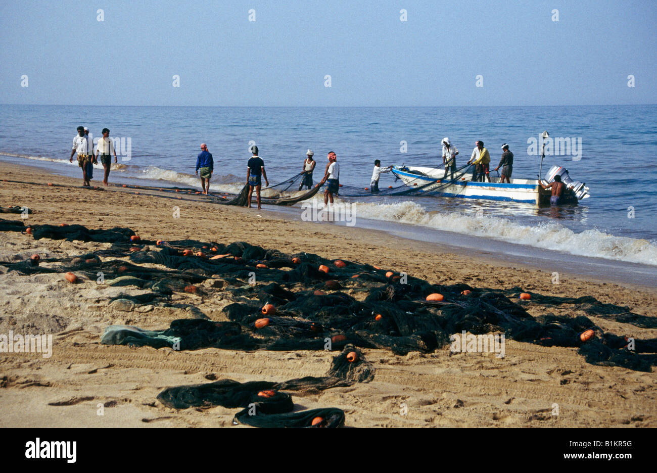 Sharjah UAE Fishermen Clearing Up Oil Spill  Khor Fakkan Stock Photo