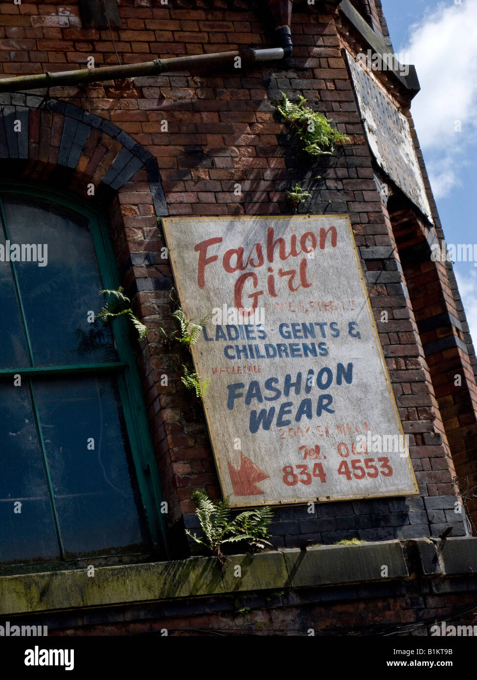 Old Fashion 'Fashion Girl' Advertisement in Manchester Stock Photo