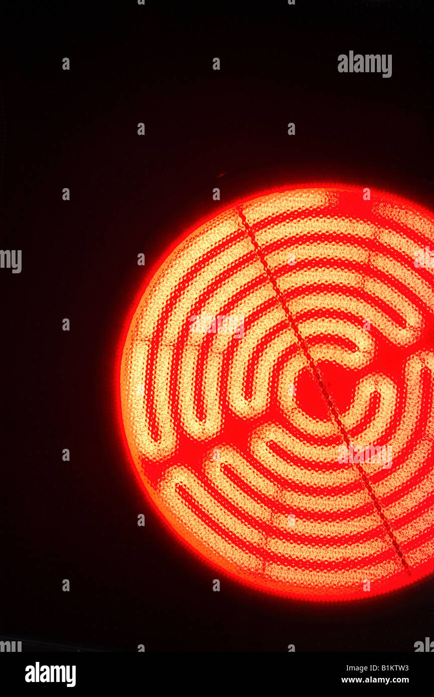 Burning hotplate of an induction cooker Stock Photo
