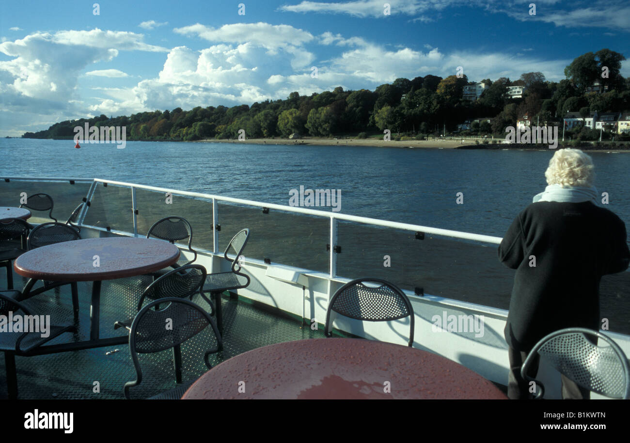 Harbor ferry on Elbe river, sight on beach of Oevelgoenne in Hamburg, Germany Stock Photo