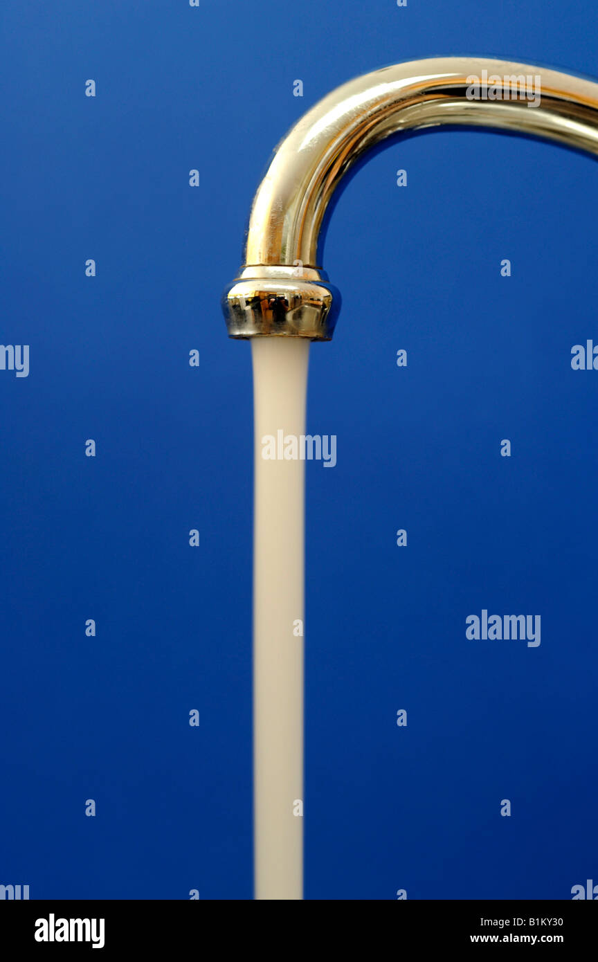 Water flowing from water faucet Stock Photo