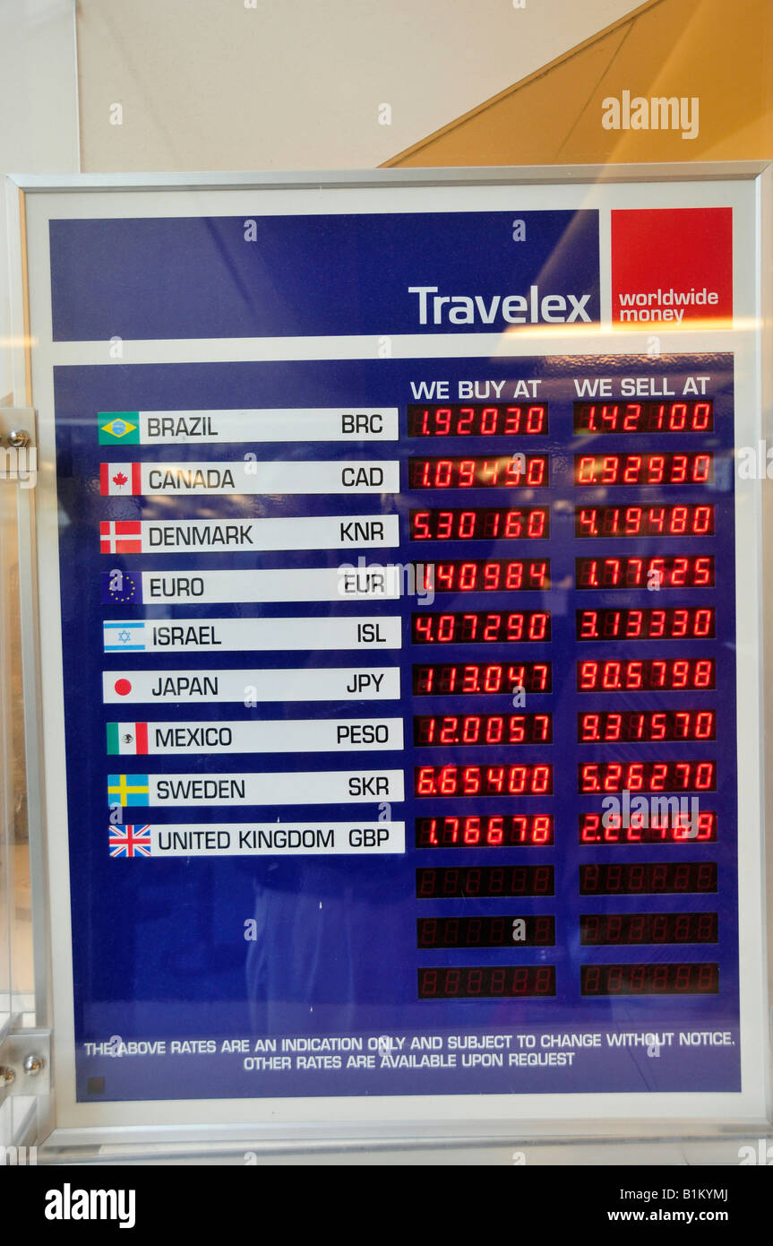 Sign in Orlando international airport showing the currency exchange amount for foreign currency Stock Photo
