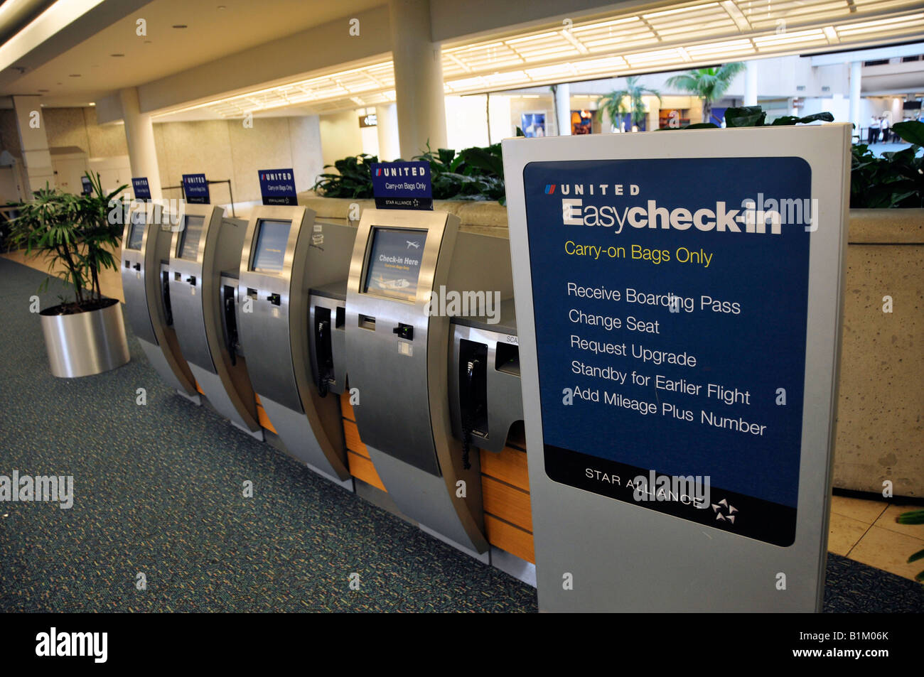Pre flight self check in station Orlando International Airport Florida Stock Photo