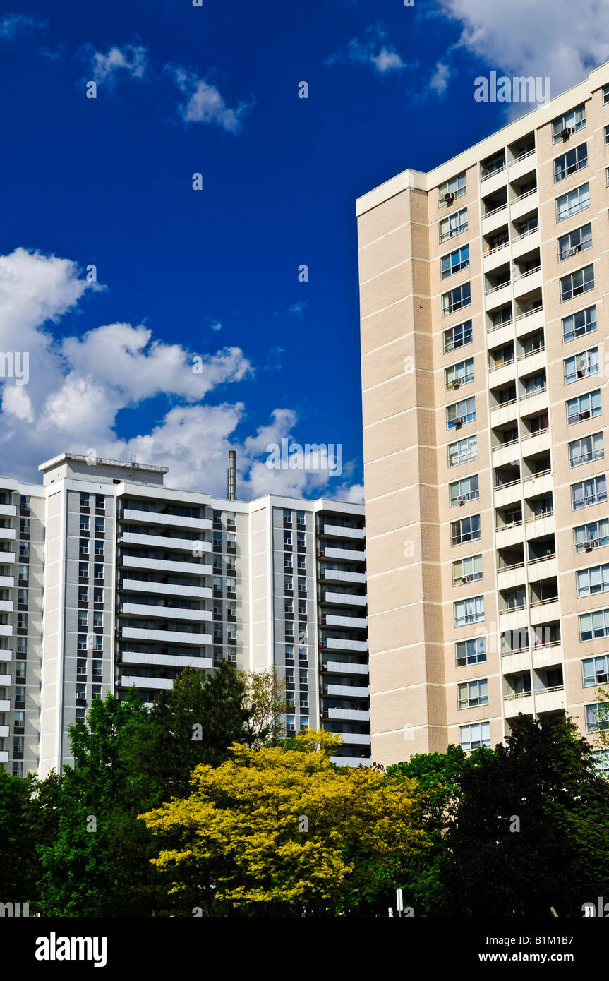 Tall residential apartment buildings with blue sky Stock Photo