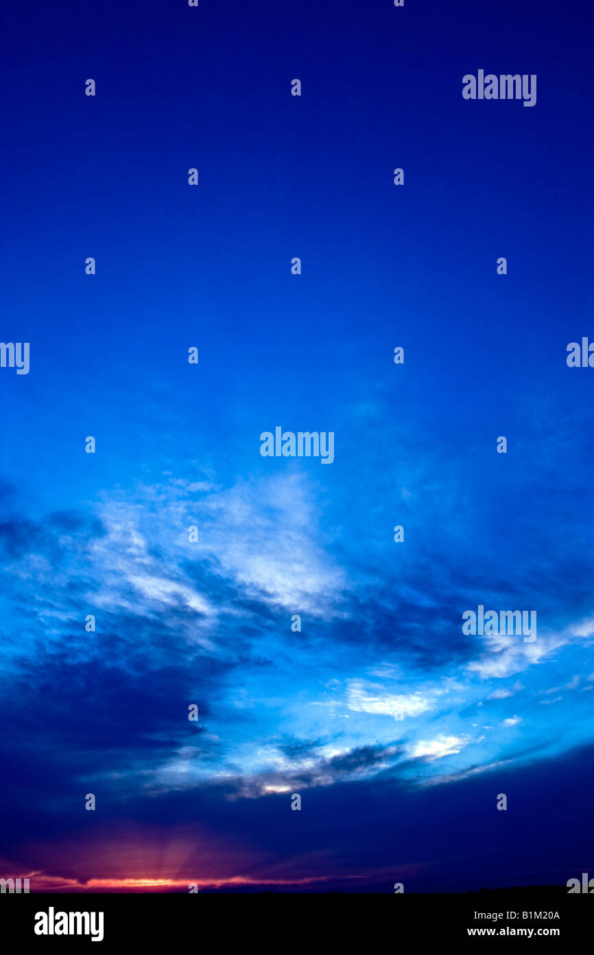 sunset scene with beautiful blue sky Stock Photo - Alamy
