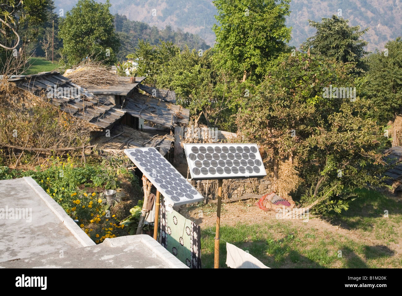 India Rishikesh solar panels outside mountain house 2008 Stock Photo