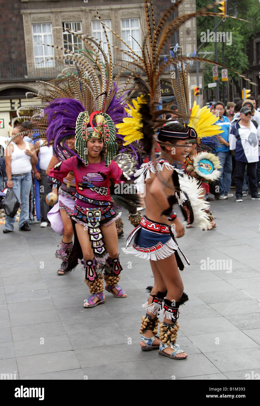 Young Mexican Dancers in Aztec Costume Zocalo Square Plaza de la Constitucion Mexico City Mexico Stock Photo
