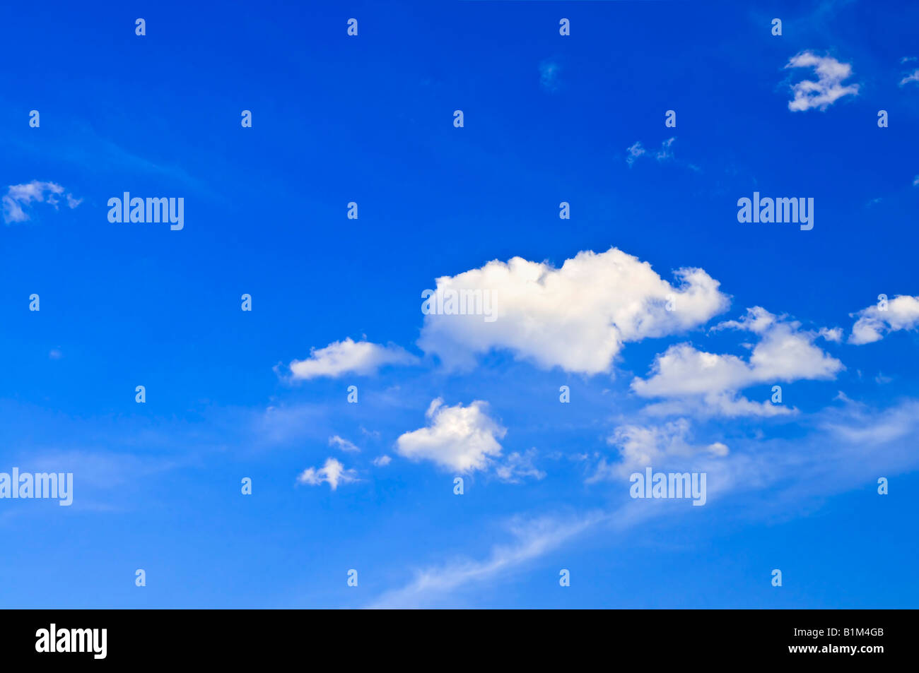 Background of blue sky with white cumulus clouds Stock Photo - Alamy