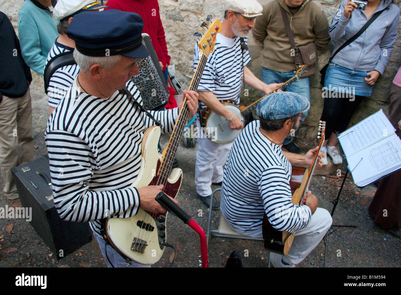 Band group of French musician’s playing accordion guitar and banjo