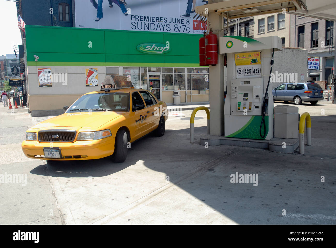 A NYC taxi pulls into a BP gas station in the Soho neighborhood of New York Stock Photo