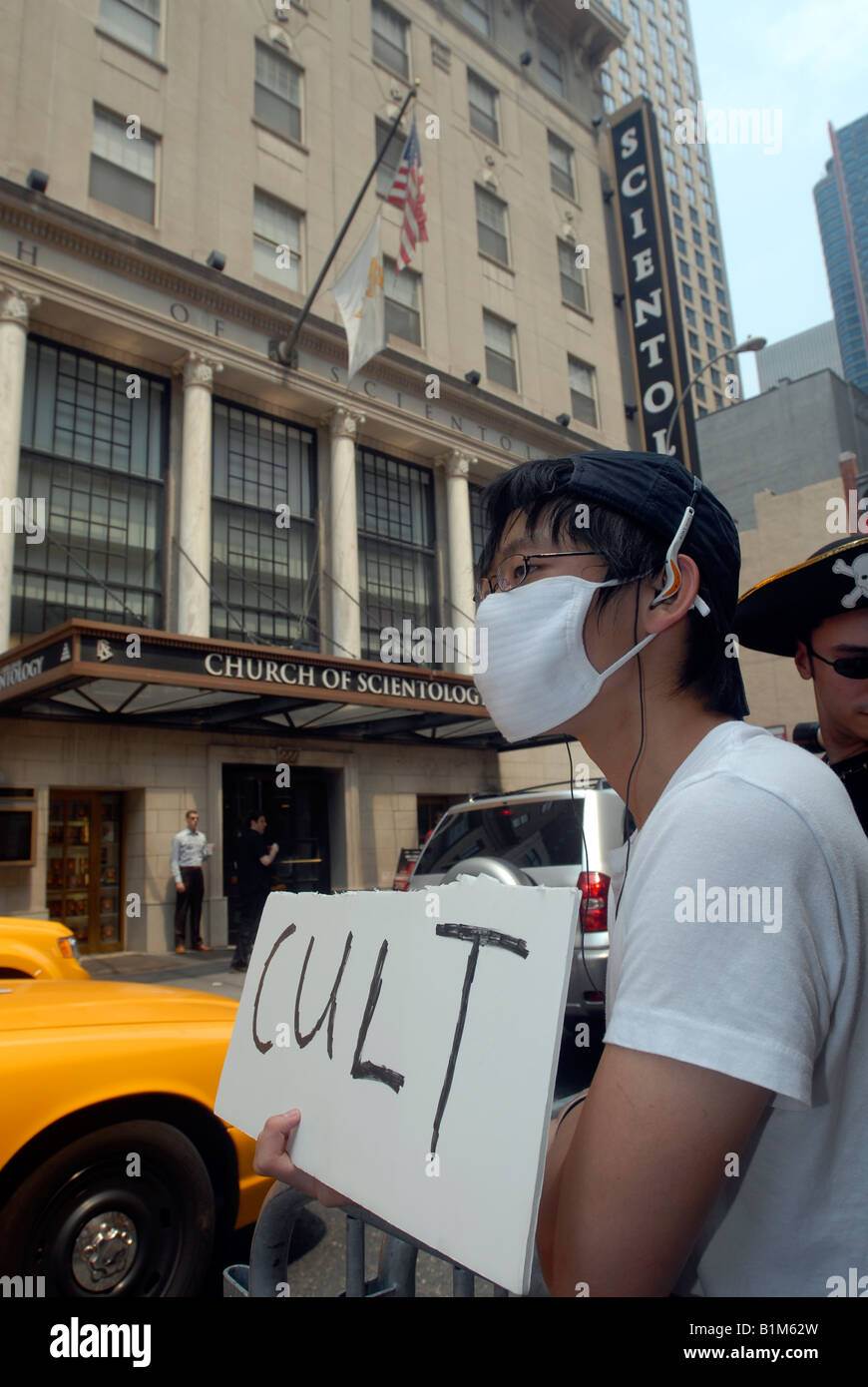 Members of the anti Scientology group calling themselves Anonymous protest outside the Church of Scientology in midtown New York Stock Photo