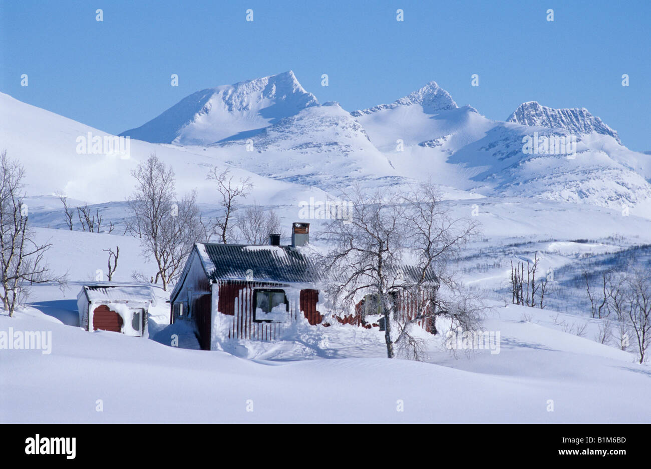 A cabin in winter time at the border between Norway and Sweden Stock Photo