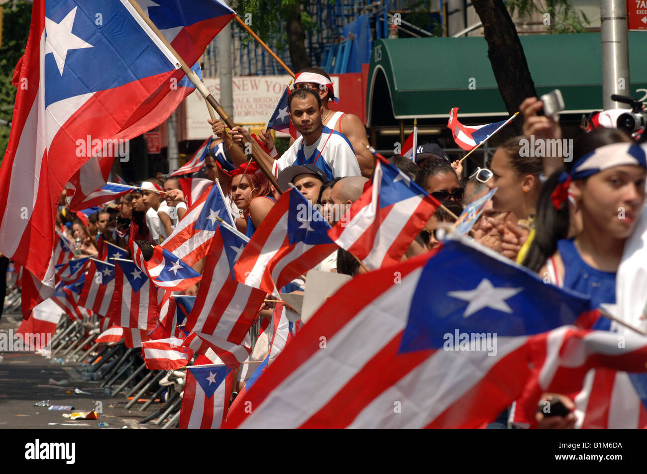 Spectators watch the 13th Annual National Puerto Rican Day Parade in New York on Fifth Avenue Stock Photo