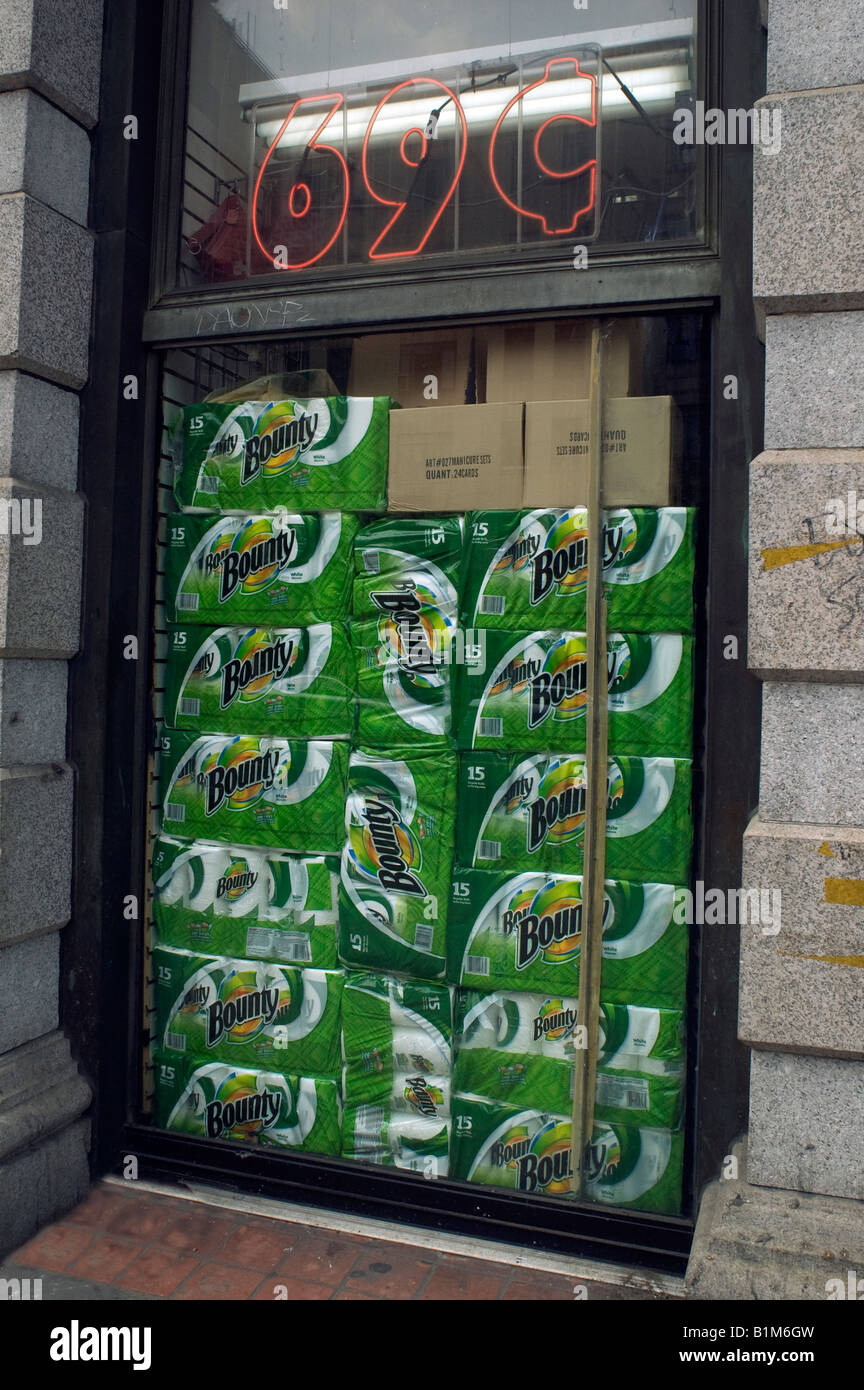 Display of Bounty paper towels in the window of a 99 cent store in the