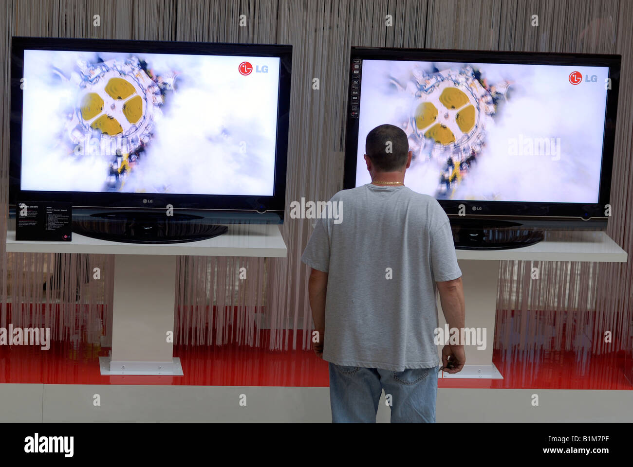 A consumer browses the LG Scarlet high definition televisions in the World  Financial Center in New York Stock Photo - Alamy