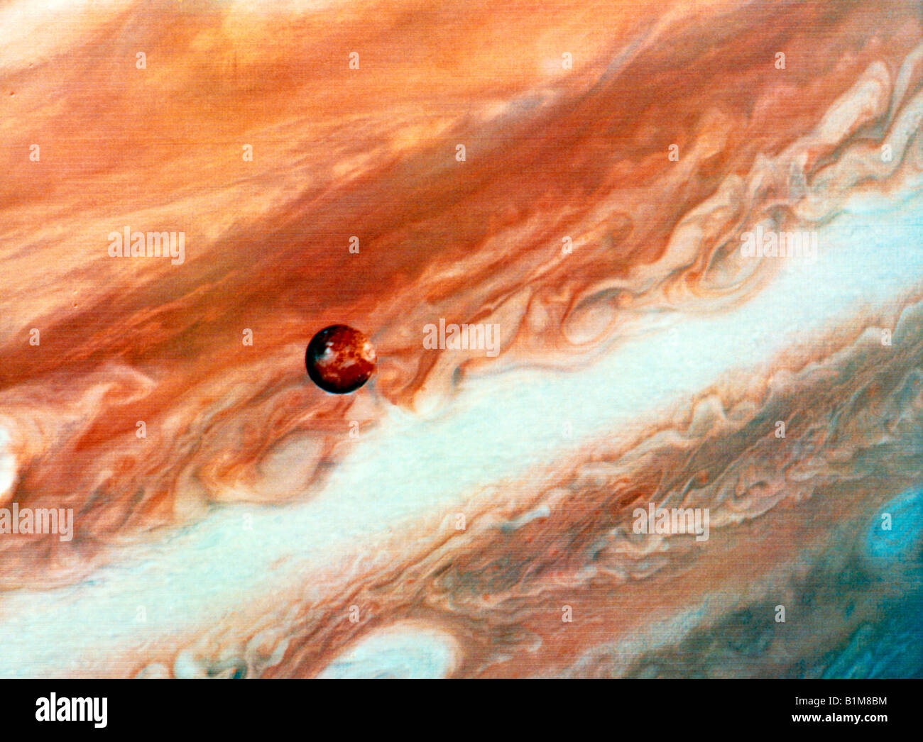 Jupiter With The Moon Io The Innermost Of The 4 Largest Moons Orbiting Jupiter Stock Photo