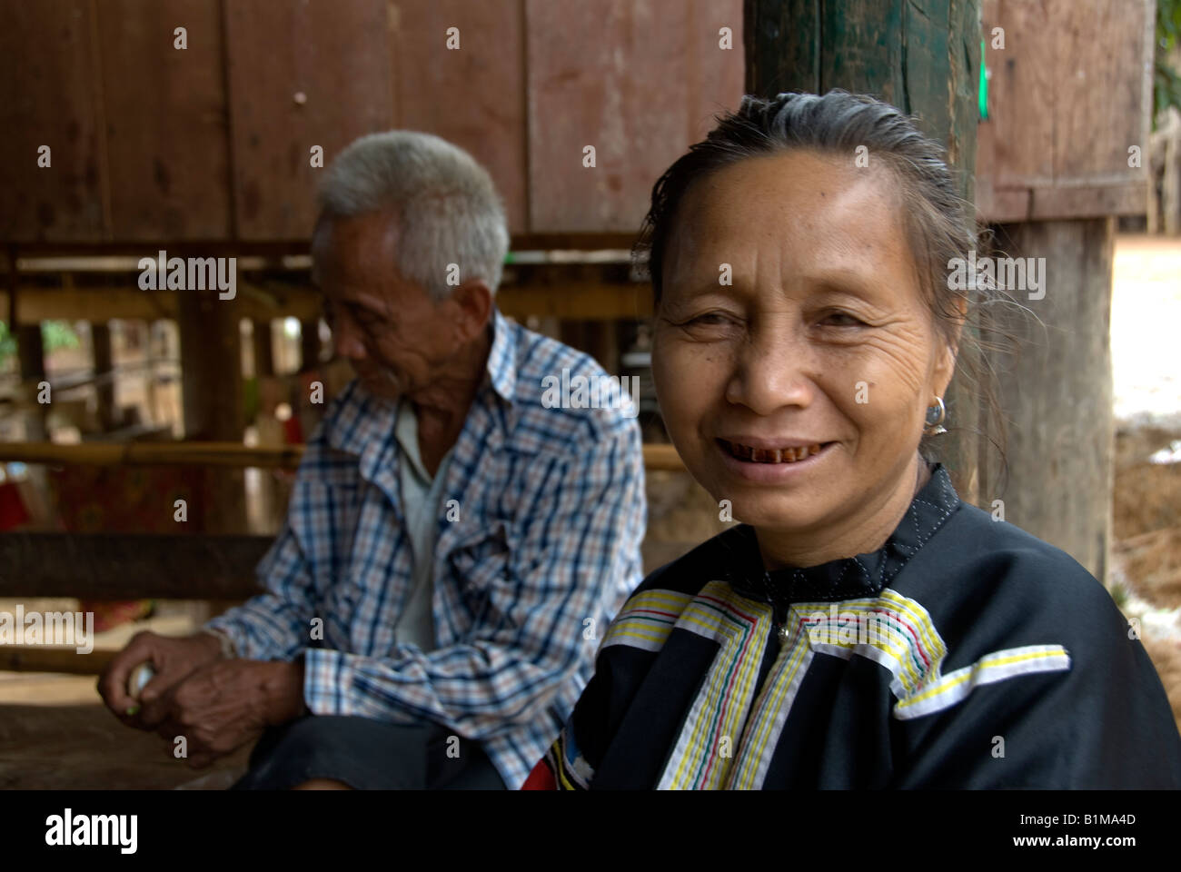 Older Lahu hill tribe man and woman in a village in north Thailand ...