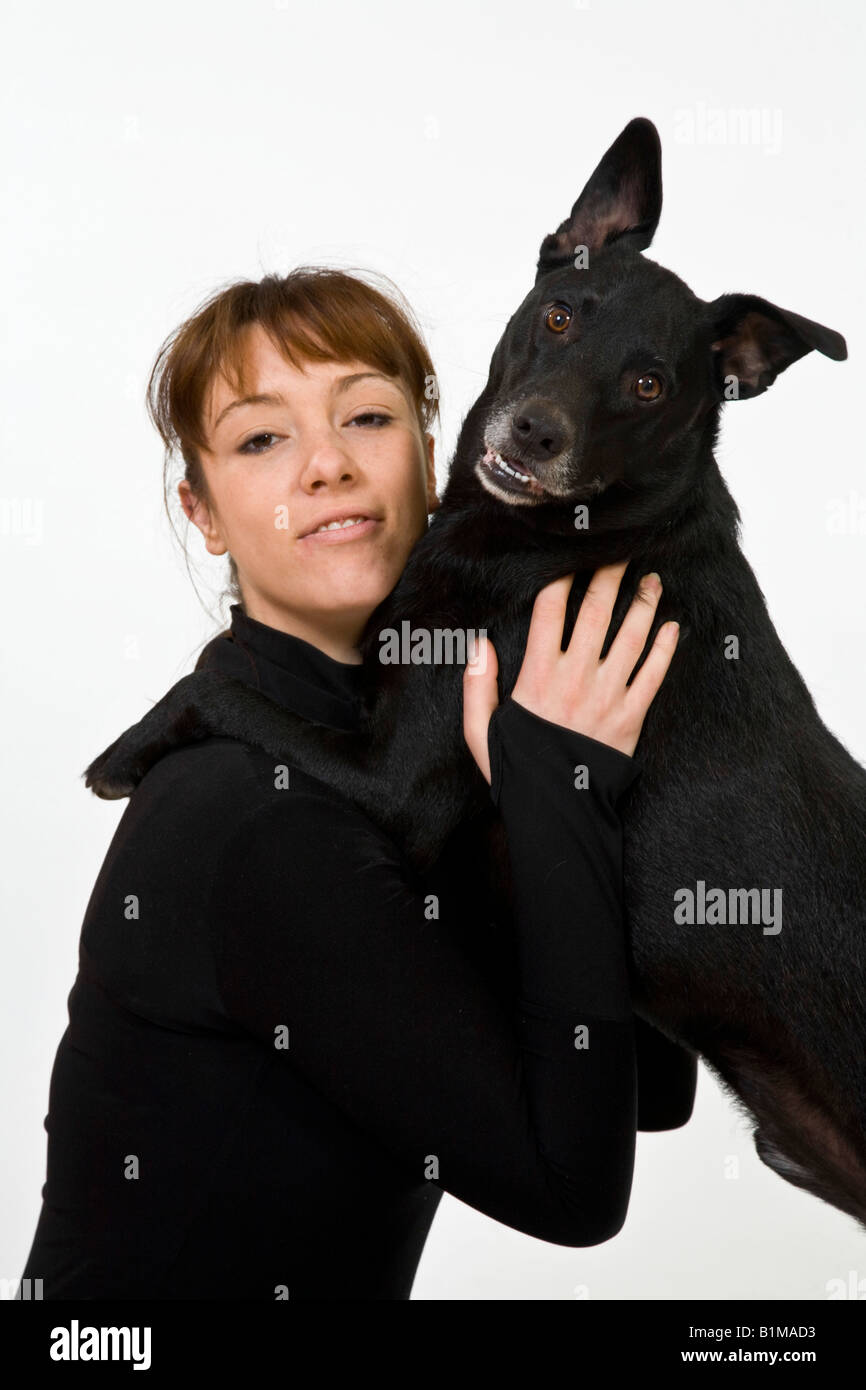 Woman with black dog hi-res stock photography and images - Alamy