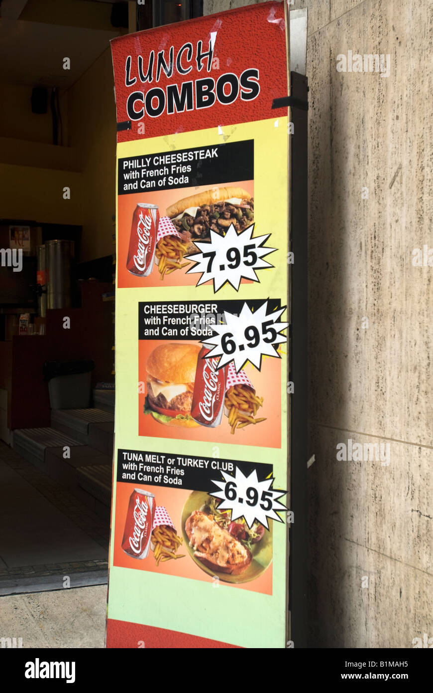 A restaurant in Lower Manhattan in New York advertises it s menu of unhealthy choices Stock Photo