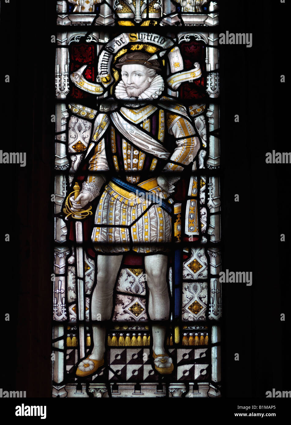 Stained Glass Window showing Edmund Slyfield Wearing a Dublet and Hose Saint Nicholas Church Great Bookham Surrey England Stock Photo