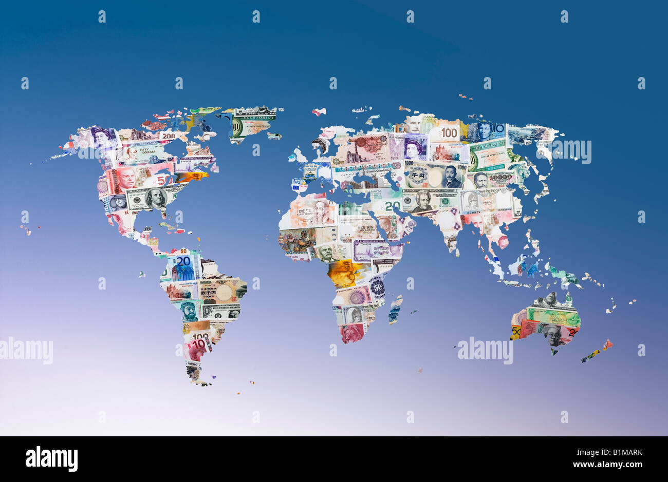 Montage of international currency on map of the world Stock Photo