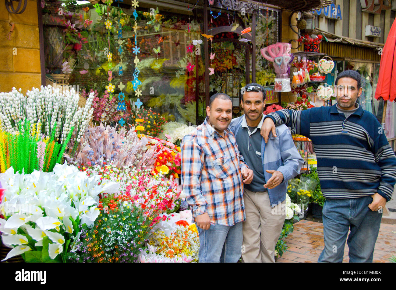 Owners Of The Gardenia Flower Pose In Front Of Their Shop In Zamalek Stock Photo Alamy