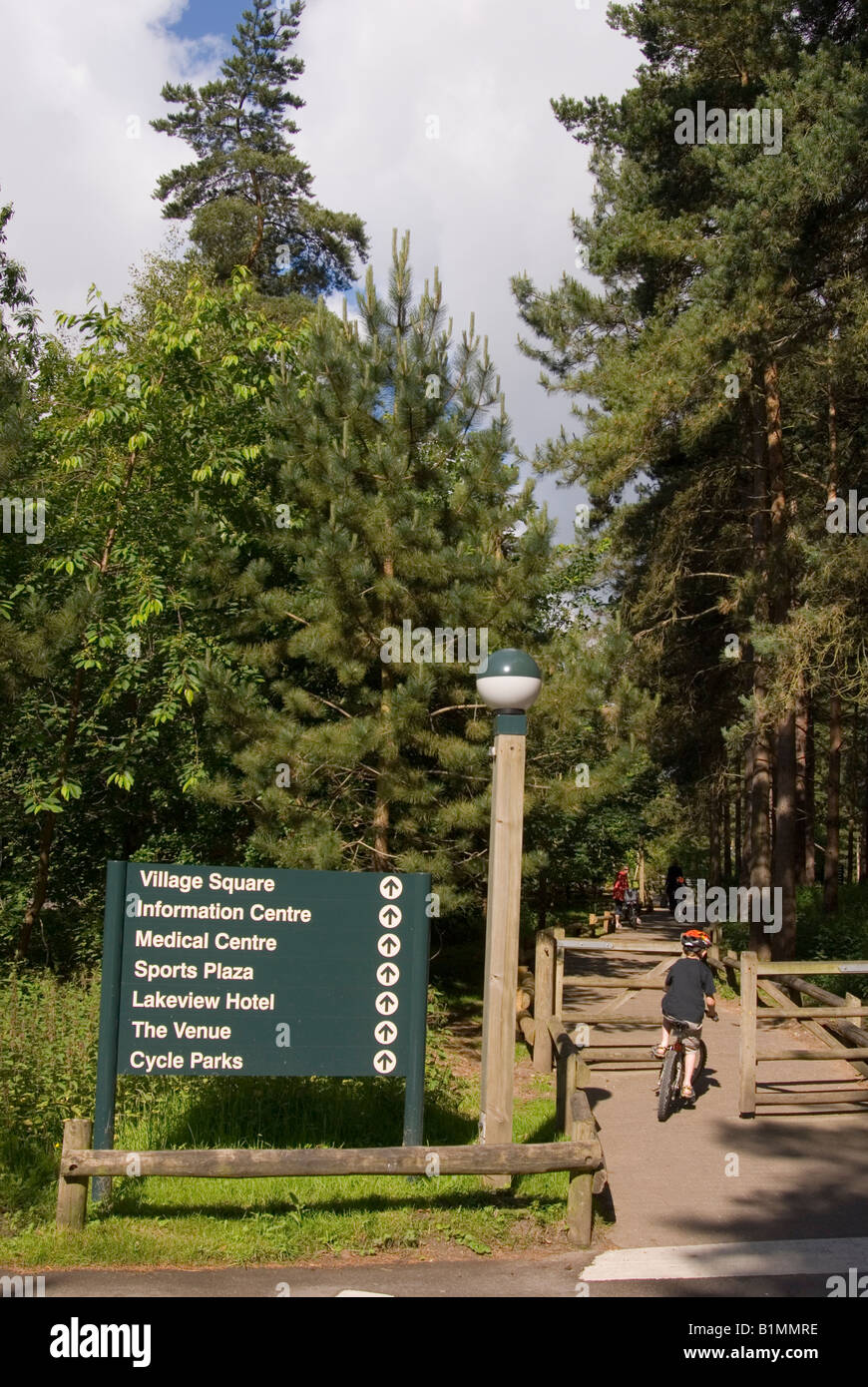Young Boy Cycling At Center Parcs at Elveden near Thetford,Uk Stock